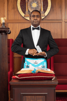 Person holding the LEGO gavel