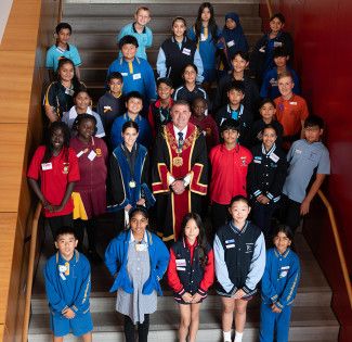 Mayor Memeti with school children at the election of the Junior and Deputy Junior Mayor