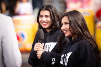 Two young people smiling