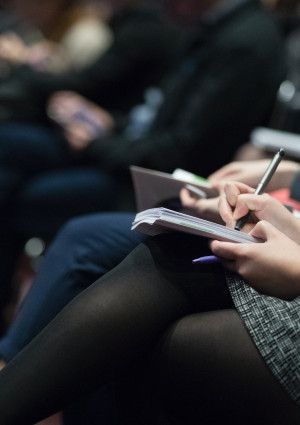 people sitting in a meeting